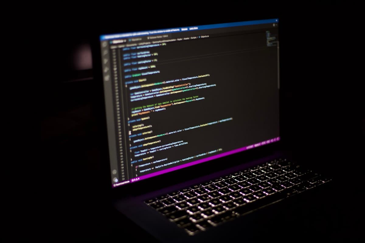 Code displayed on a laptop